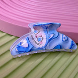 Mon-ster “Bubu Smile” Crescent Hair Claw